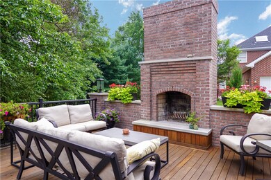 Great entertaining area with brick fireplace, outd