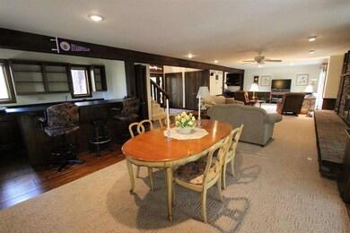 There is a beautiful fireplace in the living room.