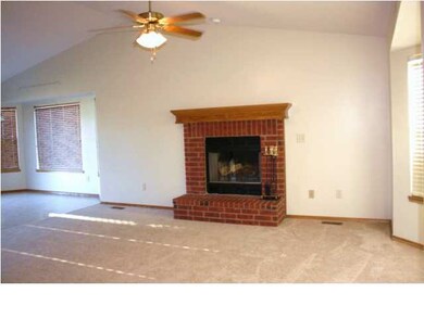 LIVING ROOM WITH WOOD BURNING FIREPLACE, VAULTED C