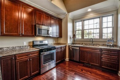 Lots of natural light flows into the kitchen.