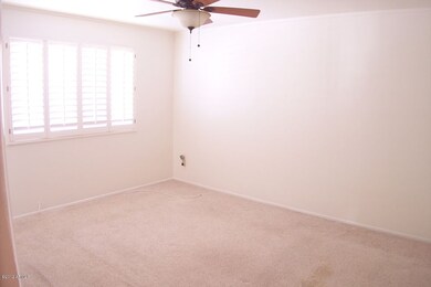 Master Bedroom W/Ceiling Fan & Shutters