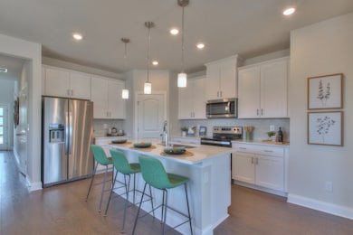 Photo is not of the actual home, but is an inspirational photo of builder’s model home and may depict options, furnishings, and/or decorator features that are not included