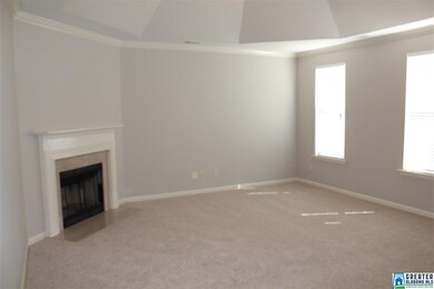 LARGE FAMILY ROOM WITH VAULTED TURRET CEILING.