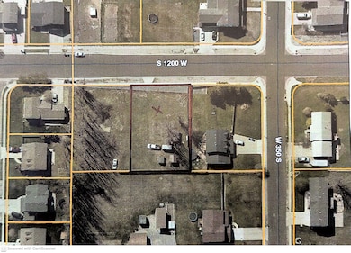 Aerial view of property's location featuring property parcel outlined
