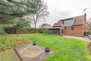 Rear view of home and backyard.