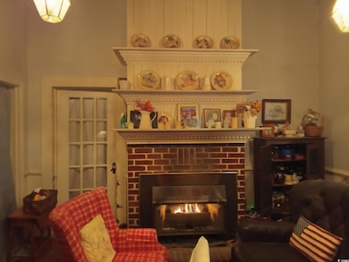 Living area featuring a fireplace