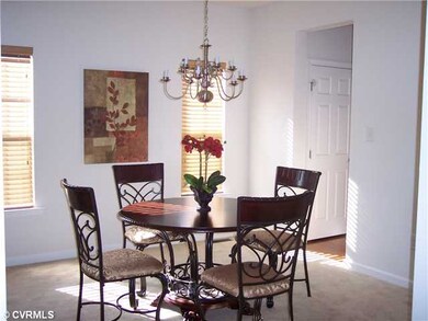 Dining Room - Formal dining room, also, is bright 