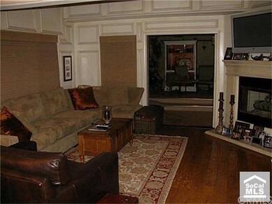 Living Room adjacent to great covered Balcony / pa
