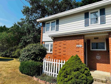 8207 Florida Unit A Common, Oscoda, MI 48750 - photo 2