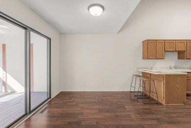 Dining area with breakfast bar.