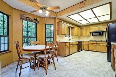 Breakfast nook with bay windows.