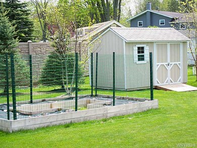 Shed. Conveniently located shed, and plant garden,