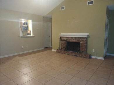 Living room with Fireplace and cathedral ceiling
