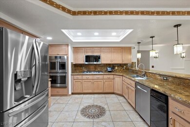 Kitchen featuring appliances with stainless steel