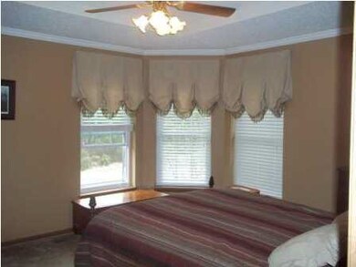 Master bedroom with coffered ceiling