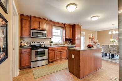 Large eat-in kitchen with stainless appliances and island