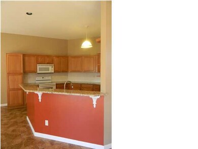 Kitchen with Granite Breakfast Bar