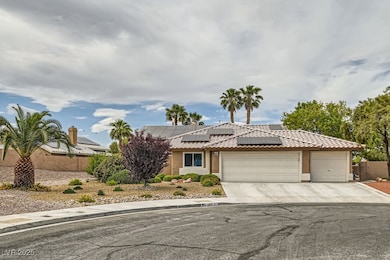 View of front of property featuring a tile roof, a