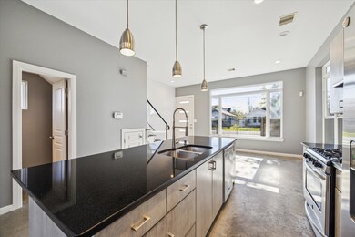 The oversized kitchen island provides ample storag