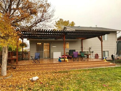 Newly painted back covered deck. Private yard!