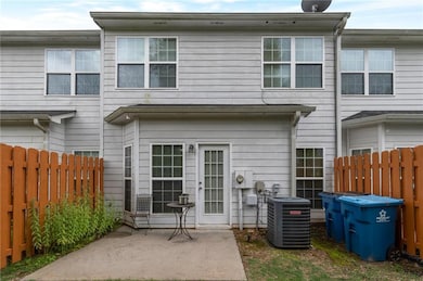 Rear view of property featuring a patio and cooling unit