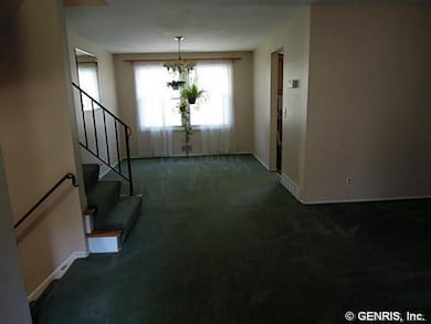 Dining Room Formal dining room w/ carpeting over h