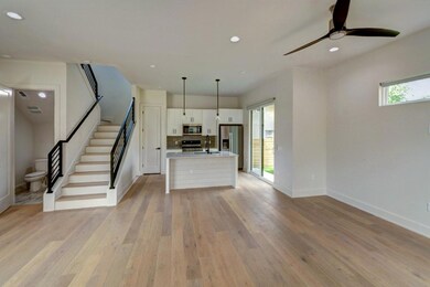 Kitchen with light wood-style floors, white cabin