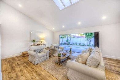 Living Room with sliding glass wall unit.  Amazing