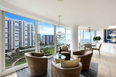 Sunroom / solarium featuring a water view