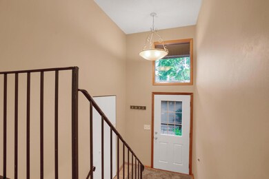 The home is a split level with plenty of room to kick your shoes off in the foyer.