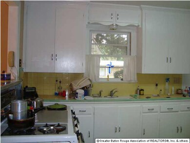 The Kitchen is so nice with freshly painted white 