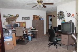 Formal living room currently used as off