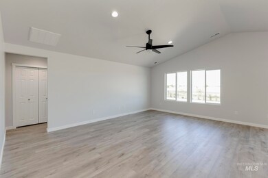 Unfurnished room with light wood-style floors, lofted ceiling, recessed lighting, and a ceiling fan