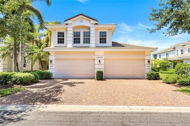 Mediterranean / spanish house with a garage, decorative driveway, and stucco siding