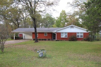 FRONT: HOME SITS ON A LARGE LOT