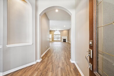 Love the foyer with a lighted art niche.