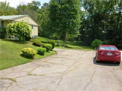 Parking Lot/Garage. DOUBLE car width driveway - TO