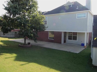 This home offers a covered back patio!