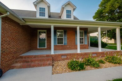 Welcoming wrap-around front porch!