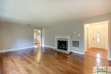 Living room with wood burning fireplace