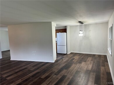 Living room looking to dining room and kitchen