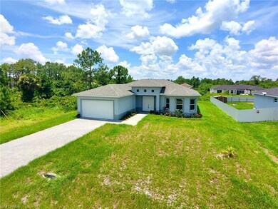 View of front of home with decorative driveway, an attached garage, stucco siding, and a shingled roof