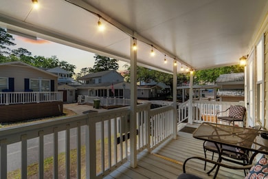 Deck at dusk with a residential view