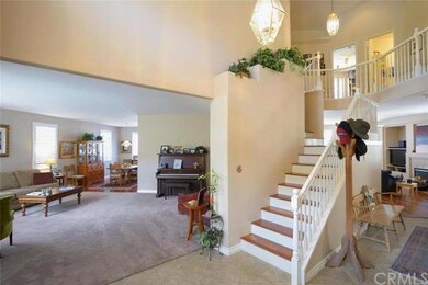 Walk into the foyer and enter the formal living an