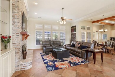 So much room to spread out ! Lovely brick fireplac