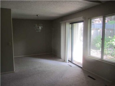 Door walks out to patio from dining room, great fo