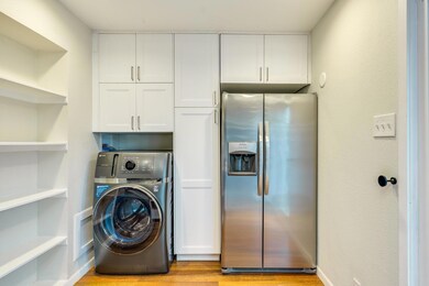 Laundry area with washer / dryer, cabinet space, 