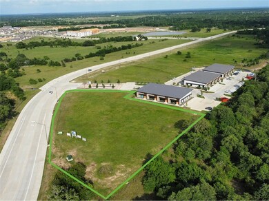 Aerial view of sparsely populated area featuring p