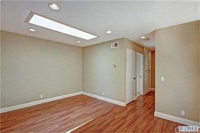 DINING AREA WITH SKYLIGHT, CUSTOM BASEBOARDS, RECE