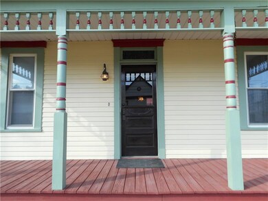 Original wood spindles and post with transom over 